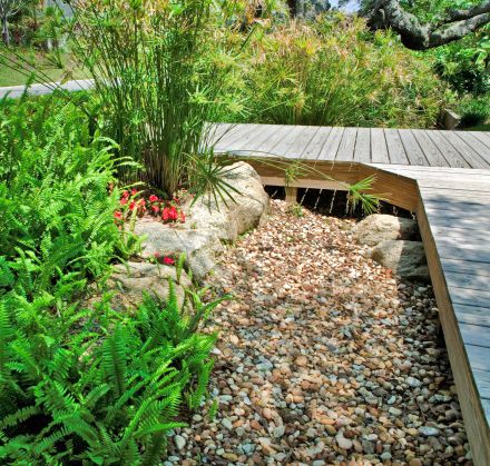 Figure 15. A wood boardwalk and gravel drain area add function and beauty.