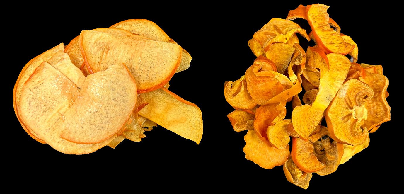 Dried slices of ‘Jiro’ persimmon with different methods. Freeze-dried (left) and dehydrated (right).