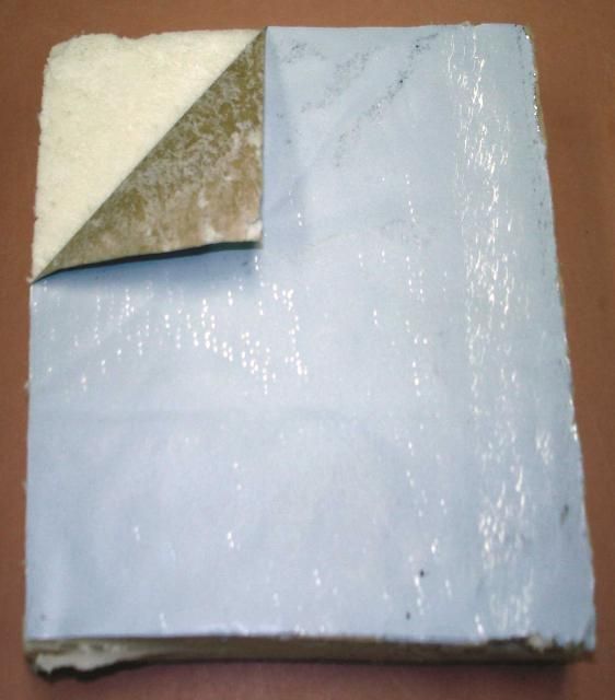 Figure 8a. Foam insulation with cardboard barrier.
